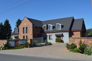 a rendering of a house with a driveway at Vila Lípa in Nový Bor