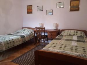 Posteľ alebo postele v izbe v ubytovaní Apartman Buble