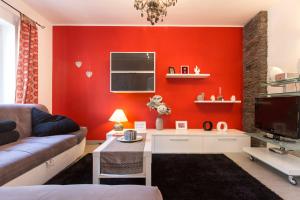 TV a/nebo společenská místnost v ubytování Apartment Gotier
