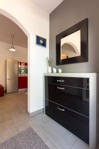 TV a/nebo společenská místnost v ubytování Apartment Gotier