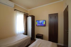 Postel nebo postele na pokoji v ubytování Casa Camelia Felix