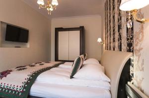 Posteľ alebo postele v izbe v ubytovaní VIP Apartamenty POD KROKWIĄ SPA