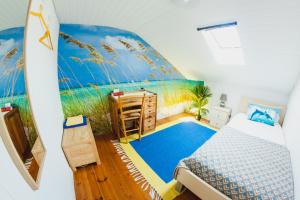 a bedroom with a swimming pool in the middle of the room at Farol de Vida in Coimbra