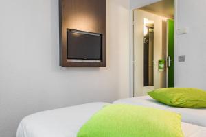 Mandarina Hotel Luxembourg Airportにあるベッド