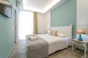 Postel nebo postele na pokoji v ubytování Casa Solmes Rooms