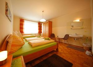 Postel nebo postele na pokoji v ubytování Appartement Helga