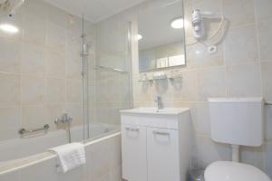 Koupelna v ubytování Hotel Vila Tina