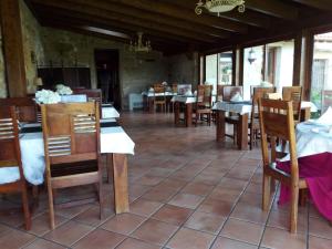 מסעדה או מקום אחר לאכול בו ב-Casa Rural Anxeliña