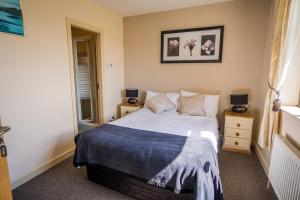 Letto o letti in una camera di Castle View House