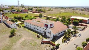 an aerial view of a building in a city at Bravo City Rondonópolis in Rondonópolis