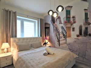 Postel nebo postele na pokoji v ubytování VIP Apartamenty KRUPÓWKI