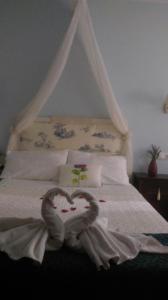 A bed or beds in a room at La Casa del Telar