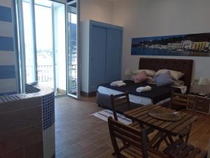 Posedenie v ubytovaní Casa Vacanze Riva Destra