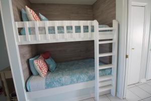 a couple of bunk beds in a room at Grand Beach Resort Unit 313 in Gulf Shores +29 photos