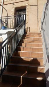 a set of stairs leading to a building at Hispanoconcucense in Teruel