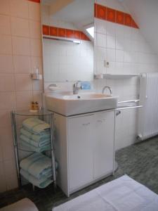 Salle de bains dans l'établissement Haus Hildegunde