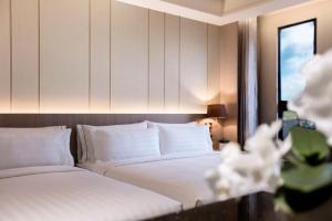 Katil atau katil-katil dalam bilik di Hotel Valletta