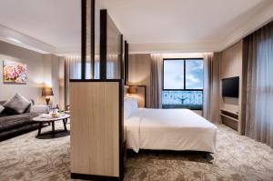 Katil atau katil-katil dalam bilik di Hotel Valletta