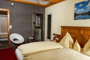 Letto o letti in una camera di Haus Hirschpoint