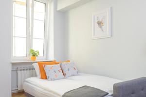 Posteľ alebo postele v izbe v ubytovaní Bright and modern apartment in the heart of the Old and New Town