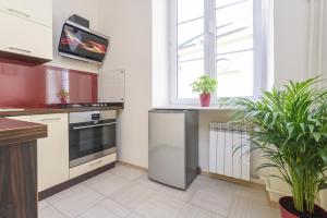 Kuchyňa alebo kuchynka v ubytovaní Bright and modern apartment in the heart of the Old and New Town