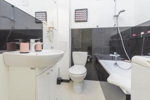 Kúpeľňa v ubytovaní Bright and modern apartment in the heart of the Old and New Town