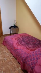 Postel nebo postele na pokoji v ubytování Casa Pueblo Alzira No Compartida