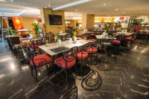 A restaurant or other place to eat at Tai Pan Hotel - SHA Plus Certified