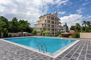Πισίνα στο ή κοντά στο Hotel Monalisa Chitwan +17 φωτογραφίες