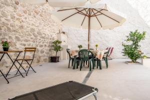 Posedenie v ubytovaní Carlentini house B&B