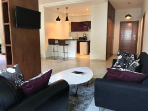 Zona d'estar a Residence Awale Abidjan