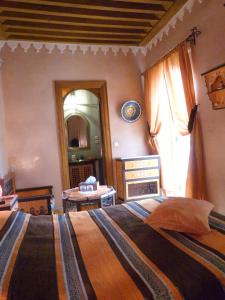 Postel nebo postele na pokoji v ubytování Riad Habib