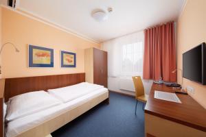 Posteľ alebo postele v izbe v ubytovaní Hotel Nikolas