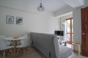 TV a/nebo společenská místnost v ubytování Aelia Apartments