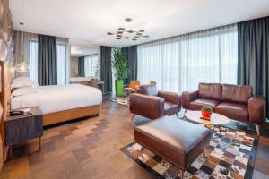 Voodi või voodid majutusasutuse Emerald Hotel toas