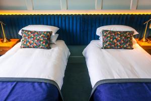 Voodi või voodid majutusasutuse Hotel Imperial Dundalk toas