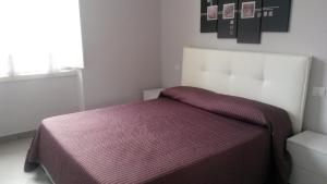 Ліжко або ліжка в номері Suite La Dolce Vita
