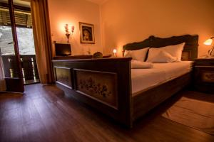 Postel nebo postele na pokoji v ubytování Hotel Gasthof WASTL