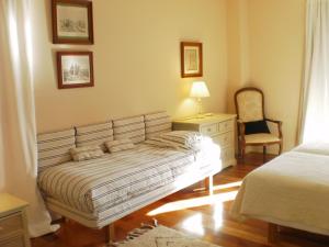 Posteľ alebo postele v izbe v ubytovaní Hotel Santa Coloma del Camino