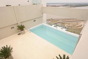 Sundlaugin á Asuncion Rent Suites Centro eða í nágrenninu