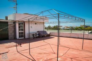 Patio lub wspólna przestrzeń na świeżym powietrzu w obiekcie Comfortable flat in El Fraile