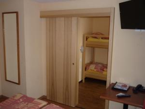 Postel nebo postele na pokoji v ubytování Hotel Europa Guest House