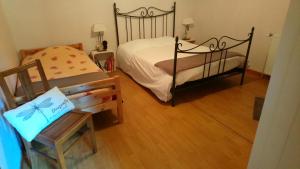 Ένα ή περισσότερα κρεβάτια σε δωμάτιο στο La Ferme Du Levant