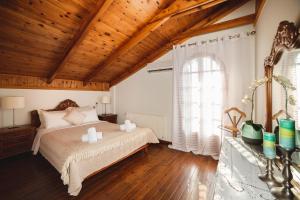 Postel nebo postele na pokoji v ubytování Villa Elea + 37 fotografií