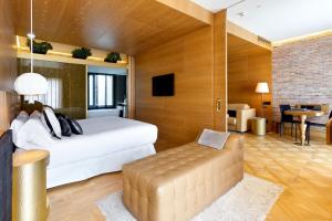 מיטה או מיטות בחדר ב-Hotel España Ramblas