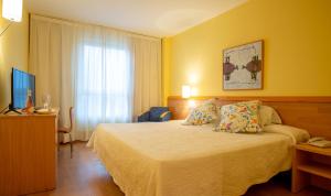 Postel nebo postele na pokoji v ubytování Flag Hotel Valencia - Florazar