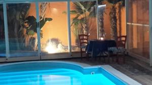 a view of a swimming pool in a house at Villa Salvatore in San Leone