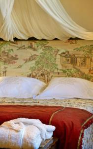 Posteľ alebo postele v izbe v ubytovaní Hotel Santa Coloma del Camino