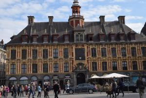 a large building with people walking in front of it at Paddy's Place in Lille