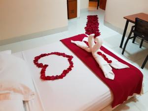 Voodi või voodid majutusasutuse Hotel Murali - Cerca del Aeropuerto de Guayaquil toas